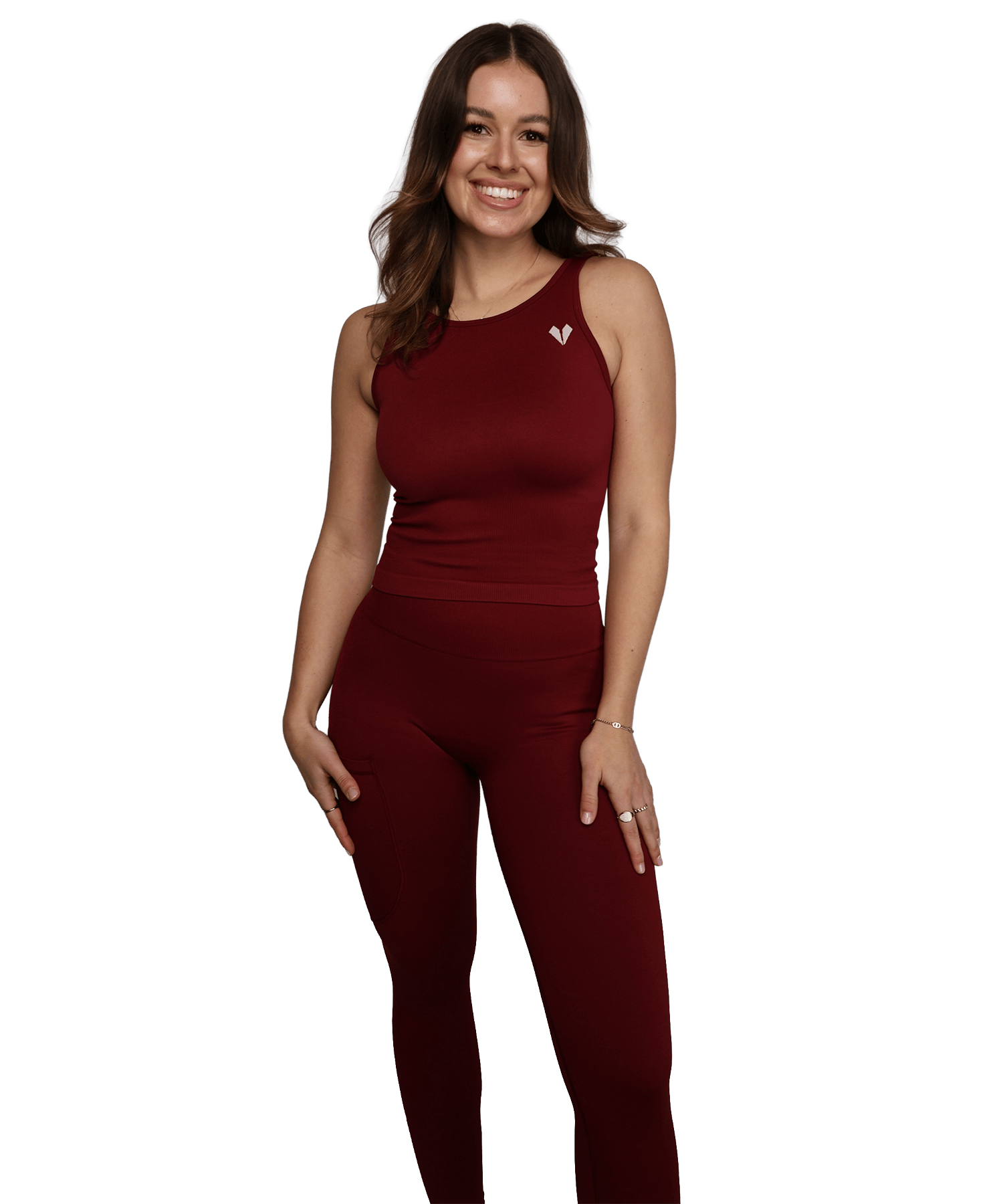 Model trägt BERGMENSCH Seamless Top und Leggings in Burgundy